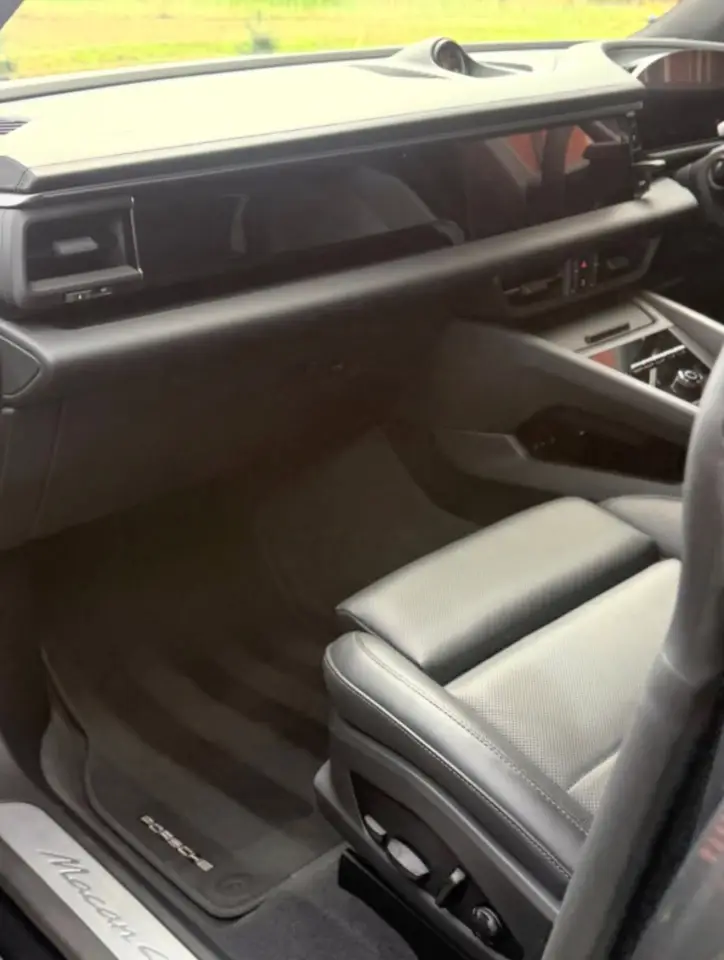 Clean leather seats and centre console after interior detailing